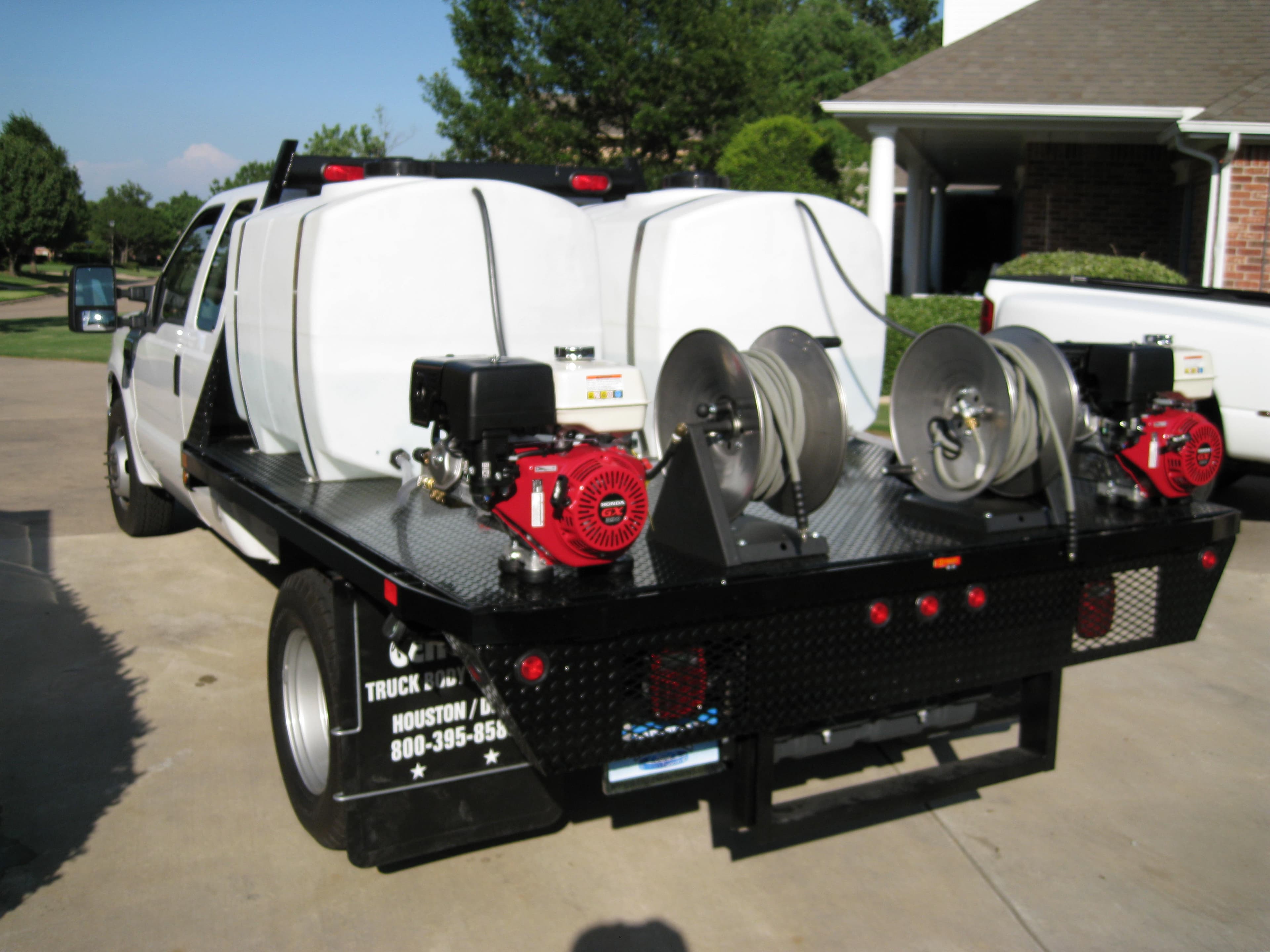 Truck mounted fleet washing system